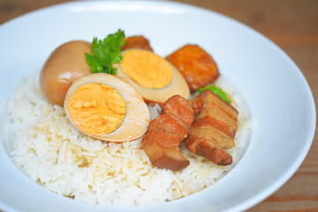 Rice and egg and pork in brown sauce,Thai food