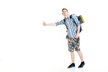 Travel man hitchhiking. young male hitchhiker on white background