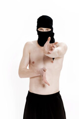Ninja on white background. Male fighter in black clothes