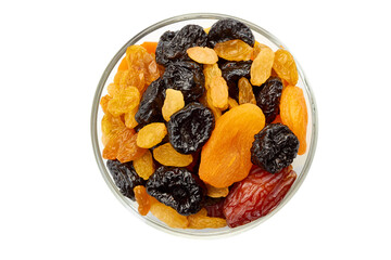 Glass bowl of dried fruits mix on white