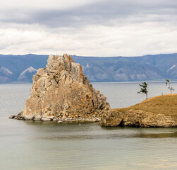 Fototapeta na wymiar Beautifil view on high rocky cliff in Baikal, Olkhon Island
