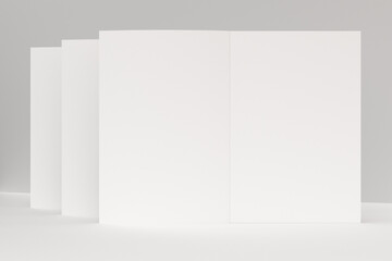 Three blank white open brochure mock-up on white background