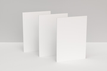 Three blank white closed brochure mock-up on white background - 157135816