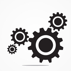 Three grey gear wheels on white background.
