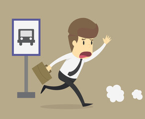 Businessman running to catch bus