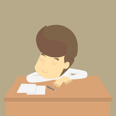 businessman falls asleep at his desk