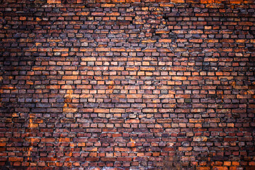 Antique brick wall vintage texture of red stone blocks as background