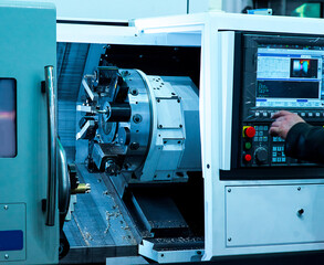 Operator machining automotive part by turning machine, Industry machine background