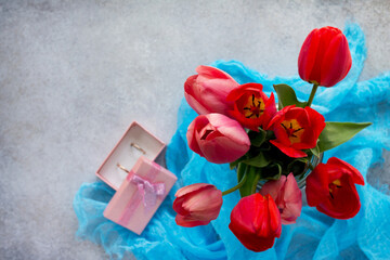 Background wedding. Beautiful fresh pink and red tulips of flowers in a vase. Copy space. Top view.