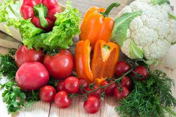 Different vegetables as a tomatoes, cauliflower, peppers and cherry tomatoes 