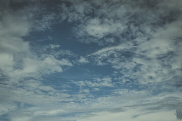 white fluffy clouds with background blue sky