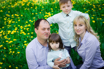 Family portrait in a spring park.