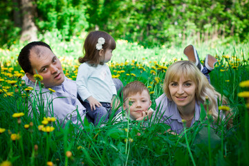 Family portrait in a spring park.