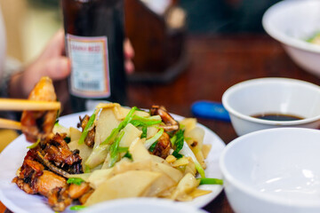 Vietnamese freshfood with beer, herbs and chili. Vietnam's national dish.