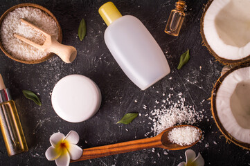 Coconut and oil on wooden table .Organic and healthy food concept. Beauty and SPA treatment product.