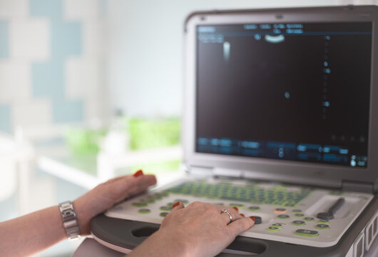 The ultrasound diagnostician is conducting a study in the hospital's office