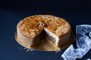 walnut pie on a black background