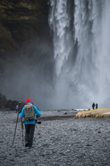 A photographer taking photo of Skogafoss water fall, Iceland - 157146211