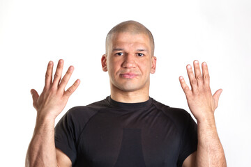 Portrait of a cheerful man showing palms