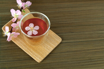 Сup of tea with blossom branch