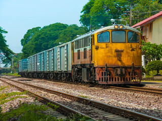 Obraz premium Freight train was passing rural station, 2016. (Taken from public area.)