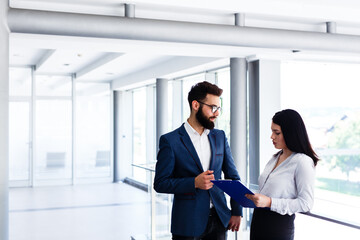 Fototapeta premium Business couple discussing about their job and planing how to success