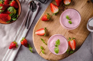 Keuken foto achterwand Milkshake Strawberries milkshake summer drink