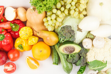 Set of multicolored fresh raw vegetables and fruits, isolated
