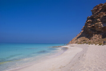 Fototapeta na wymiar The white sand beach on the island of Sokur, Yemen, view. The weather is beautiful.