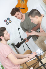 Obraz premium Young musicians composing and rehearsing
