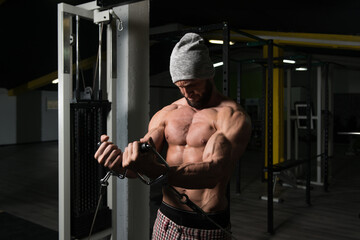 Man Working Out Chest On Cable Crossover