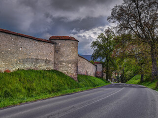 Fototapeta na wymiar Old Cathedral wall and road