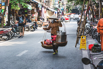 Vietnamese Street Vendor with Baskets