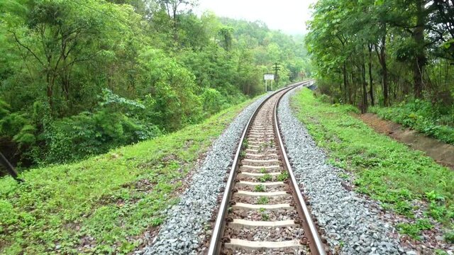 4K, Beautiful green nature view seen form train pass on countryside land.