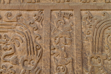 Fototapeta na wymiar Detail of a decoration at archeological site Huaca Arco Iris (Rainbow Temple) in Trujillo, Peru