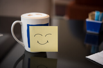 Smiling text face on coffee mug