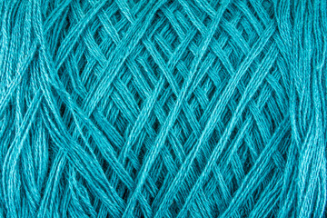 Colored wool ball as background - turquoise