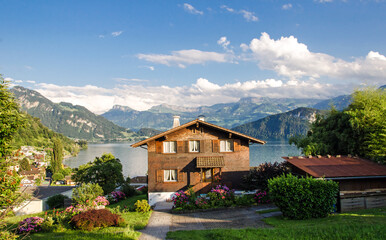 Swiss mountain hut on a lake with a wonderful garden :)