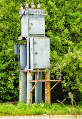 Electro transformer box on a background of trees