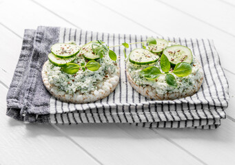 flatbreads with dip of cheese with cucumber