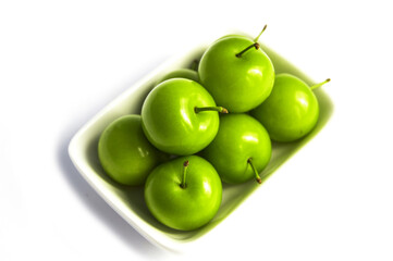 Quality and natural life-giving green sour plums,