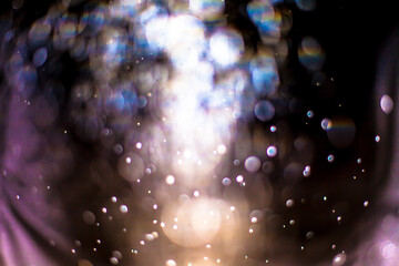 Abstract bokeh glitter background Colorful from the water bubble. Astrology Mystic Galaxy nebula...