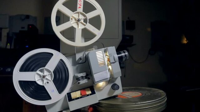 Old movie projector in operation