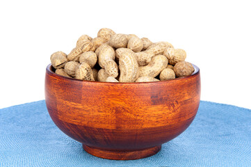 Bowl of peanuts on a white background