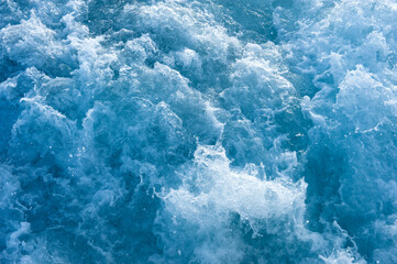 Fototapeta na wymiar Churning blue ocean water