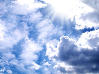 cloudy sky highlighted by sun, copy space