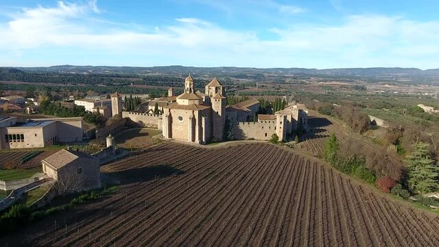 Sunset on Royal Abbey of Santa Maria de Poblet on Conca de Barbera, Catalonia, Spain