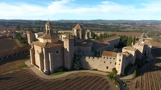 Sunset on Royal Abbey of Santa Maria de Poblet on Conca de Barbera, Catalonia, Spain