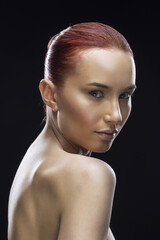 Fototapeta premium beauty girl portrait on a black background