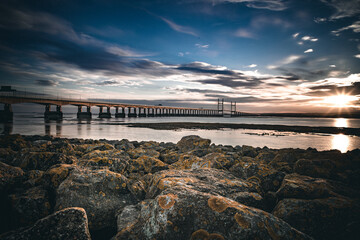 Second Severn Bridge Landscape with Rocks Sunset and blue sky